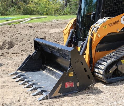 how to cut a ditch with a skid steer|digging holes with skid steer.